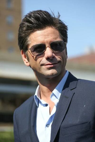 John Stamos Opens Up to Glamour About Love, Having Children, and So Much More: "All I Can Control Is Me"