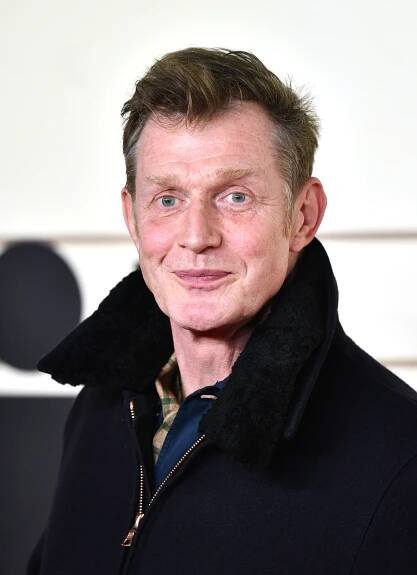 Headshot of Jason Flemyng at the Military Wives film premiere.