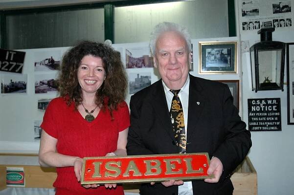 Isabel & Patrick Flanagan holding the Isabel name plate