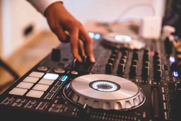 Closeup of a DJ mixing music