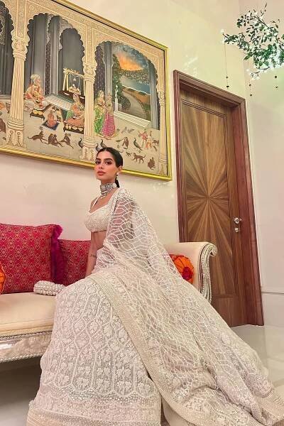 Anant ambani and Radhika Merchant Khushi Kapoor's white lehenga for Radhika and Anant Ambani's engagement