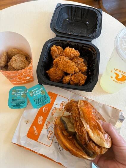 popeyes pickle menu on white coffee table