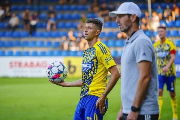 Lukáš Bartošák a asistent trenéra Lukáš Motal před utkáním s Táborském - FC Zlín