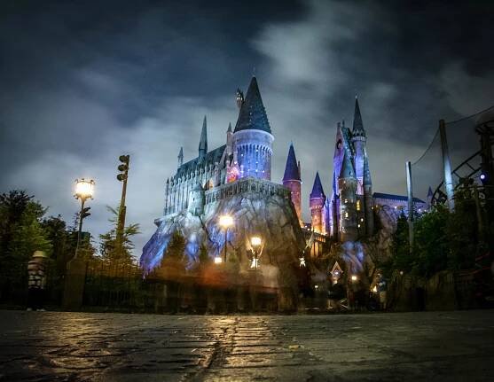 Hogwarts at night in the Wizarding World