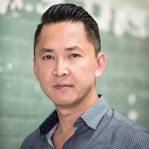Viet Thanh Nguyen portrait green background