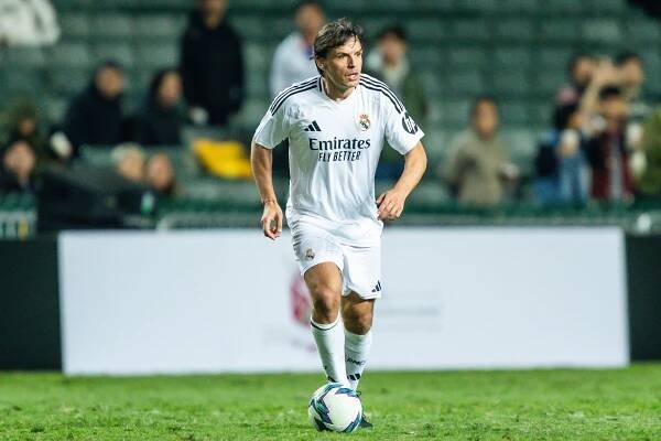 Fernando Morientes of Real Madrid Legends playing soccer.