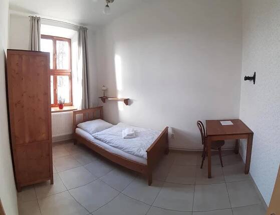 Postel nebo postele na pokoji v ubytování Penzion a restaurace U Hájků