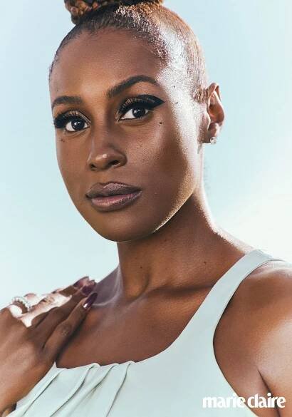 Issa Rae in JW Anderson dress; Audrey Nicole Diamonds & Jewelry ring and earrings.