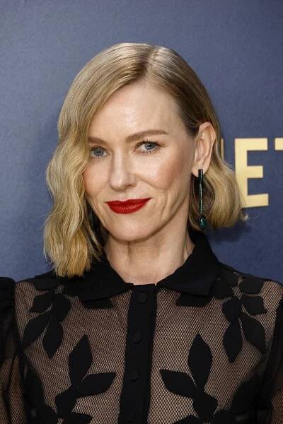 Naomi Watts with a wavy blonde asymmetrical bob