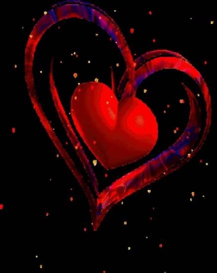 a red heart shaped object in the middle of a black background with small dots around it