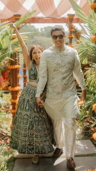 Prajakta Koli and Vrishank Khundal’s glamorous pre-wedding ensembles by Anita Dongre