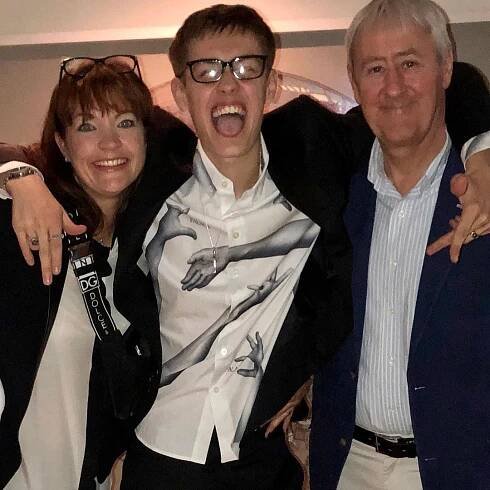 Photo of Nicholas Lyndhurst, his wife Lucy, and their son Archie.