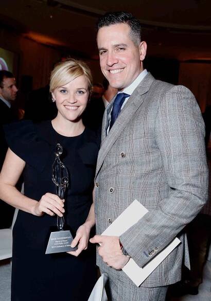 Reese Witherspoon and actor Jim Toth pose with the Grace Kelly Award during the 7th Annual March of Dimes Celebration of Babies, a Hollywood Luncheon, at the Beverly Hills Hotel on December 7, 2012 in Beverly Hills, California