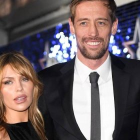 Abbey Clancy wears red mini dress to announce big news with Peter Crouch