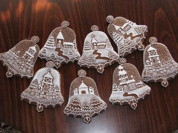 six handmade christmas ornaments sitting on top of a wooden table