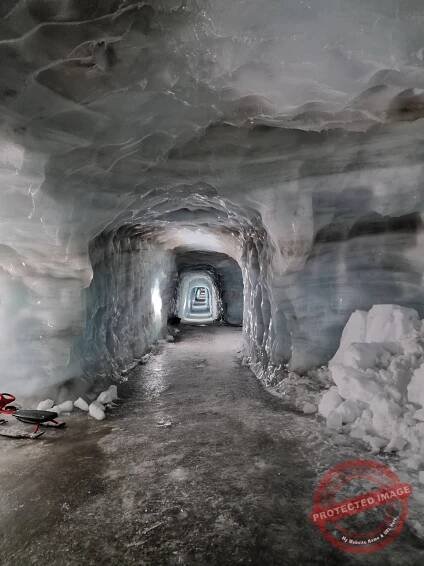 Ice tunel into the glacier