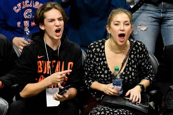 Kate Hudson and her son Ryder Robinson attend a basketball game between the Los Angeles Clippers and the Portland Trail Blazers at Staples Center on November 07, 2019 in Los Angeles, California.