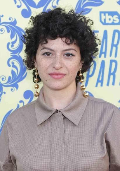 Alia Shawkat with short curly bob