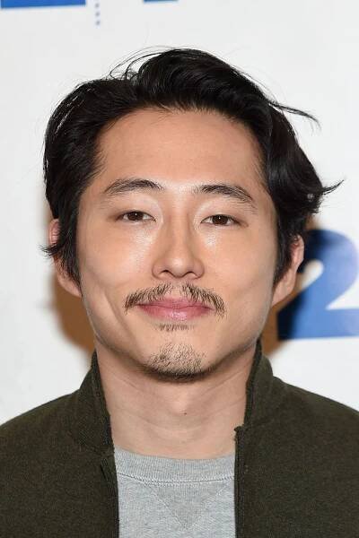 Steven Yeun short flow haircut with mustache