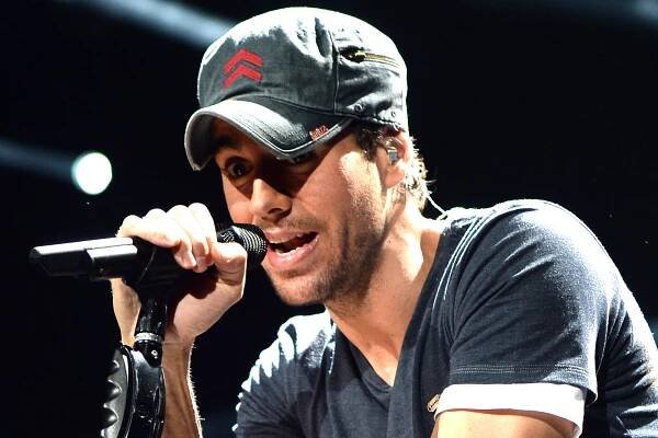 Enrique Iglesias performs onstage during Y100's Jingle Ball 2013 in Miami.