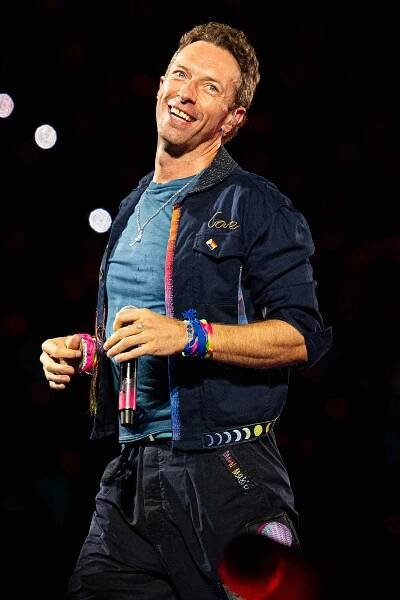 LONDON, ENGLAND - AUGUST 22: (EDITORIAL USE ONLY) Chris Martin of Coldplay performs onstage during a concert at Wembley Stadium on August 22, 2025 in London, England. 