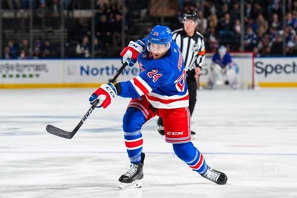 Carson Soucy #24 of the New York Rangers skates with the puck against the Tampa Bay Lightning at Madison Square Garden on April 7, 2025 in New York City. 