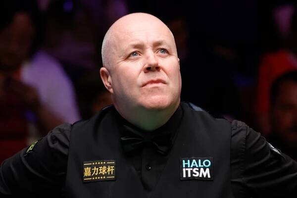 John Higgins of Scotland reacting during a quarterfinal match.