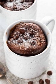 chocolate mug cake with powdered sugar on top