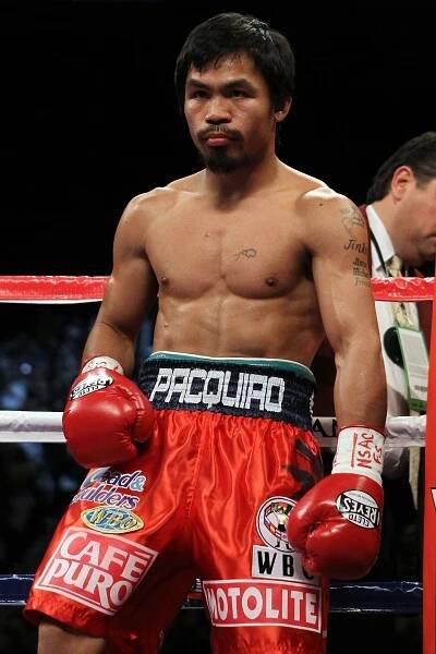 Manny Pacquiao in boxing ring.