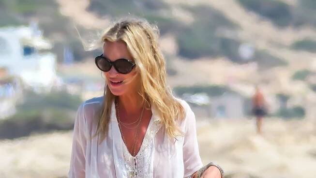 Leggy Kate Moss uses £35K Birkin as a beach bag while joining bikini-clad daughter Lila and pal Jaime Winstone as they soak up the sun during lavish Ibiza getaway