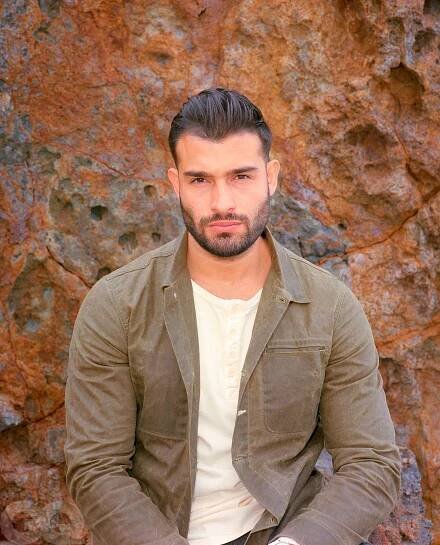 Image may contain Human Person Clothing Apparel Toni Mahfud and Coat