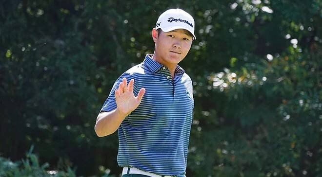 Caption: Danny Lee Smiling and Waving at The Camera Wallpaper
