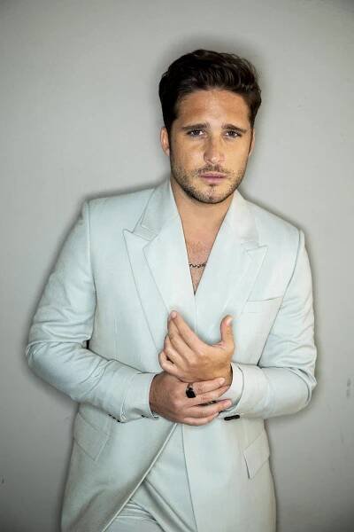 Actor Diego Boneta in a white suit