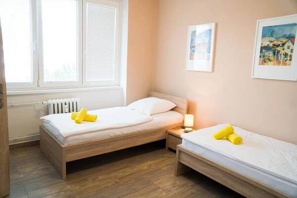 Posteľ alebo postele v izbe v ubytovaní Penzion Staré Louny