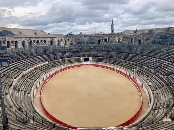 Nimes arena interior on a cloudy day. 