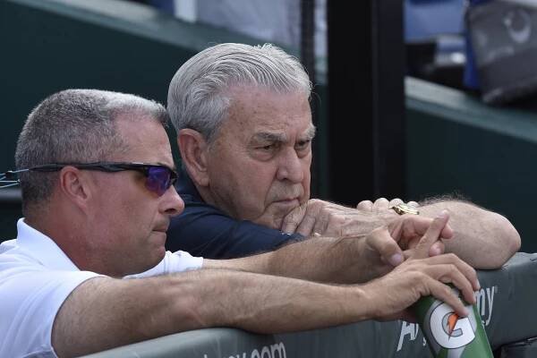 Royals GM Dayton Moore and owner David Glass