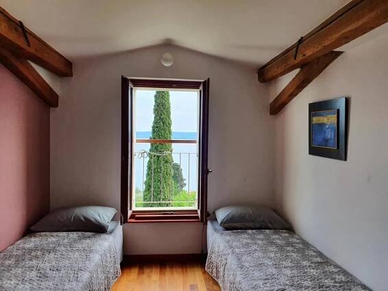 Postel nebo postele na pokoji v ubytování Vila Rosa