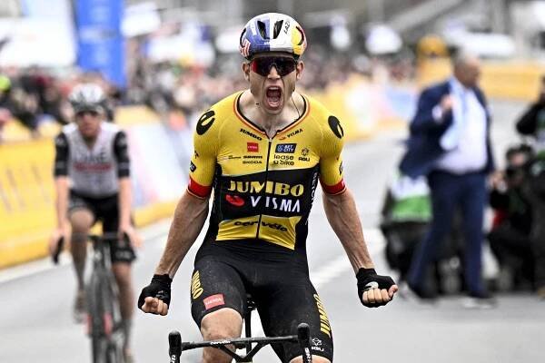 TOPSHOT  Belgian Wout van Aert of Team JumboVisma celebrates after winning the E3 Saxo Bank Classic one day cycling race 2041km from and to Harelbeke on March 24 2023 Photo by JASPER JACOBS  Belga  AFP  Belgium OUT Photo by JASPER JACOBSBelgaAFP via Getty Images