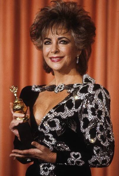 Elizabeth Taylor Winning Cecil B. DeMille Award for Lifetime Achievement Wearing Diamond Engagement Ring from Dennis Stein