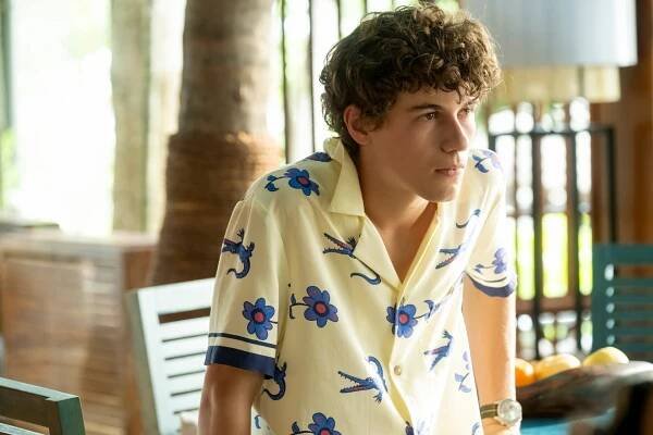 Image may contain Garrett Gardner Clothing Sleeve Person Teen Wristwatch Beachwear Head and Face