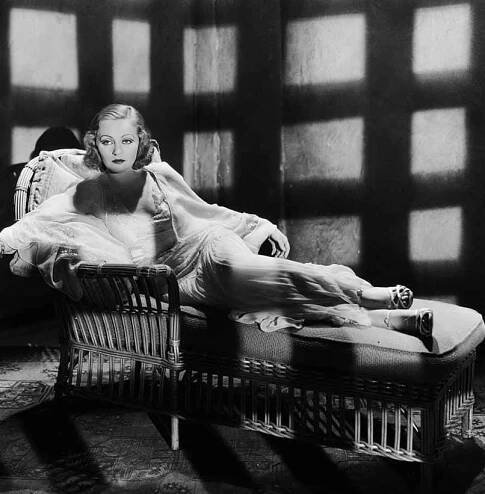 Tallulah Bankhead  lying on a couch