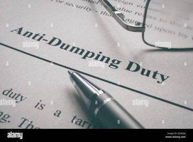 Anti-Dumping Duty words on the page and glasses. Stock Photo