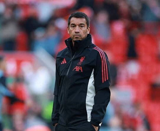 Soccer Football - Friendly - Liverpool v Athletic Bilbao - Anfield, Liverpool, Britain - August 4, 2025 Liverpool assistant manager Giovanni van Bronckhorst during the warm up before the match REUTERS/Phil Noble