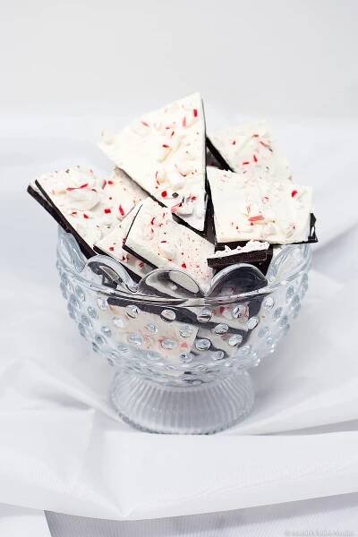 Peppermint Bark - the absolutely delicious and gorgeous marriage of mint dark chocolate, white chocolate, and crushed peppermint candy canes layered into a delightful, minty-fresh, chocolate bark.