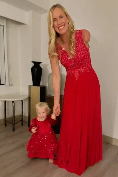 Bethany Hamilton smiles with her daughter Alaya in February 2025.
