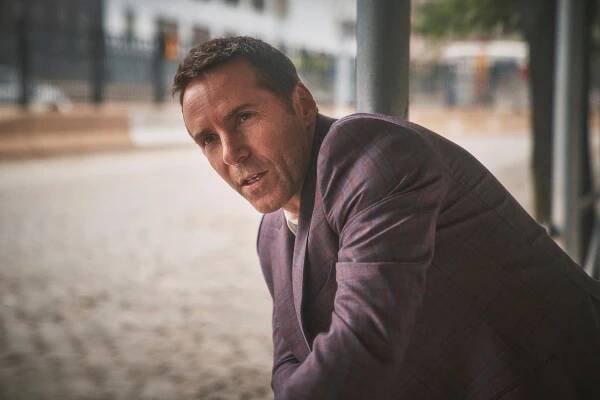 Jacket by STEPHEN SEO; shirt by RALPHLAUREN PURPLE LABEL.