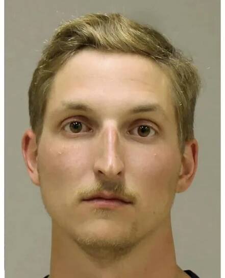 This booking photo shows Daniel Harris. Harris, one of four men charged with conspiring to kidnap Michigan Gov. Gretchen Whitmer, testified Thursday, March 31, 2022, in his own defense and denied any role in a wild conspiracy to get her before the 2020 election. Harris, Adam Fox, Barry Croft Jr., and Brandon Caserta are accused of plotting to kidnap the Democratic governor at her vacation home in northern Michigan in fall 2020 because of their disgust with government and tough COVID-19 restrictions. (Kent County Sheriff and Delaware Department of Justice via AP)