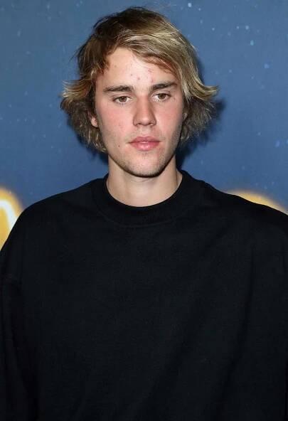 Justin Bieber Shows His Faith While Supporting Friend Patrick Schwarzenegger at His Movie Premiere