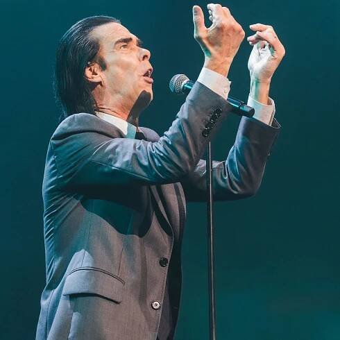 Nick Cave, No Longer So Angry About AI, Shares New “Tupelo” Video Starring an AI Elvis: Watch