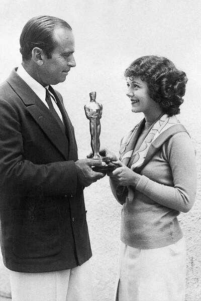Douglas Fairbanks presents Janet Gaynor with the first Academy Award for Best Actress for 'Seventh Heaven,' 'Street Angel' and 'Sunrise' at the Hollywood Roosevelt Hotel in L.A. on May 16, 1929